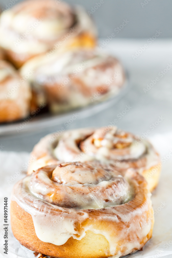 Homemade delicious cinnabon rolls with cinnamon and mascarpone frosting.