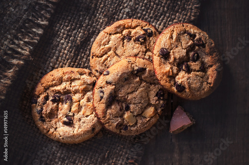 Chocolate chip cookies,  freshly baked on rustic wooden table. Selective Focus. Copy space.
