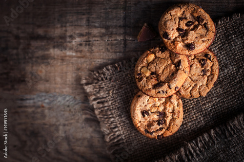 Chocolate chip cookies, freshly baked on rustic wooden table. Selective Focus. Copy space.