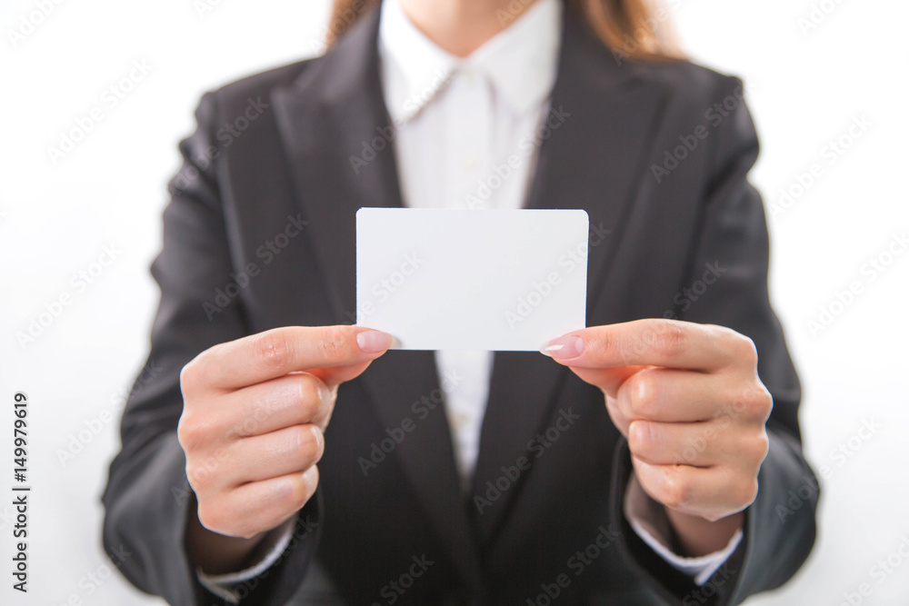 Business woman holding white business card Business woman holding white business card