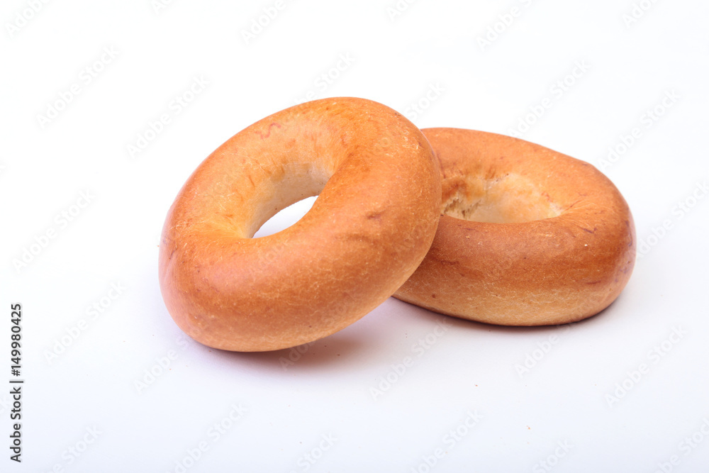 Fresh authentic New York style bagel isolated on Canvas cloth background Fresh authentic New York style bagel isolated on Canvas cloth background
