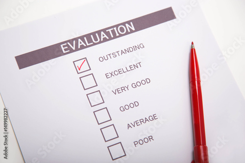 Evaluation checklist and red pen