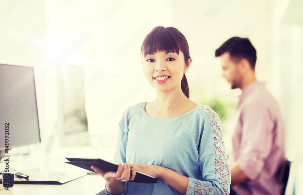 happy creative female office worker with tablet pc happy creative female office worker with tablet pc