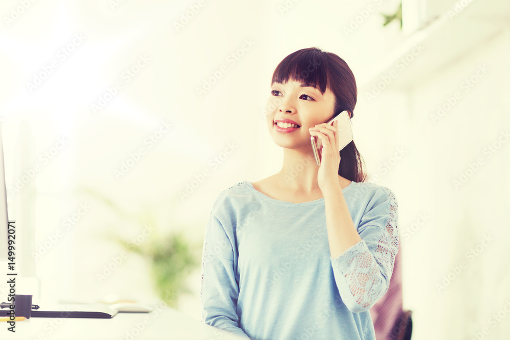 businesswoman calling on smartphone at office businesswoman calling on smartphone at office