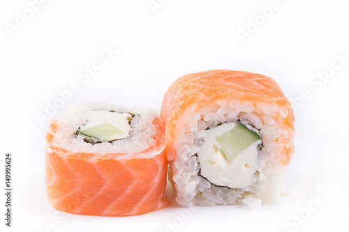 japanese Cuisine, Sushi Set: salmon roll with cheese and cucumber on a white background.