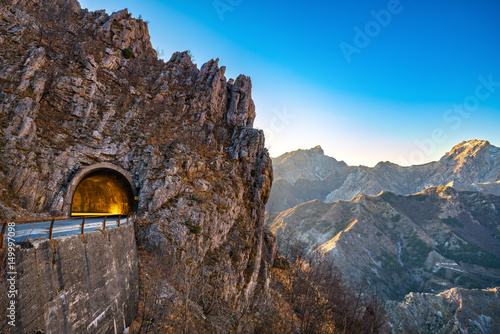 Bilde på lerret Alpi Apuane mountain road pass and tunnel view at sunset