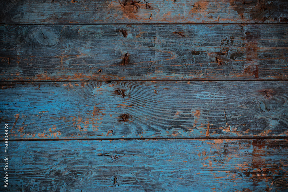 Naklejka premium old dark blue wooden background