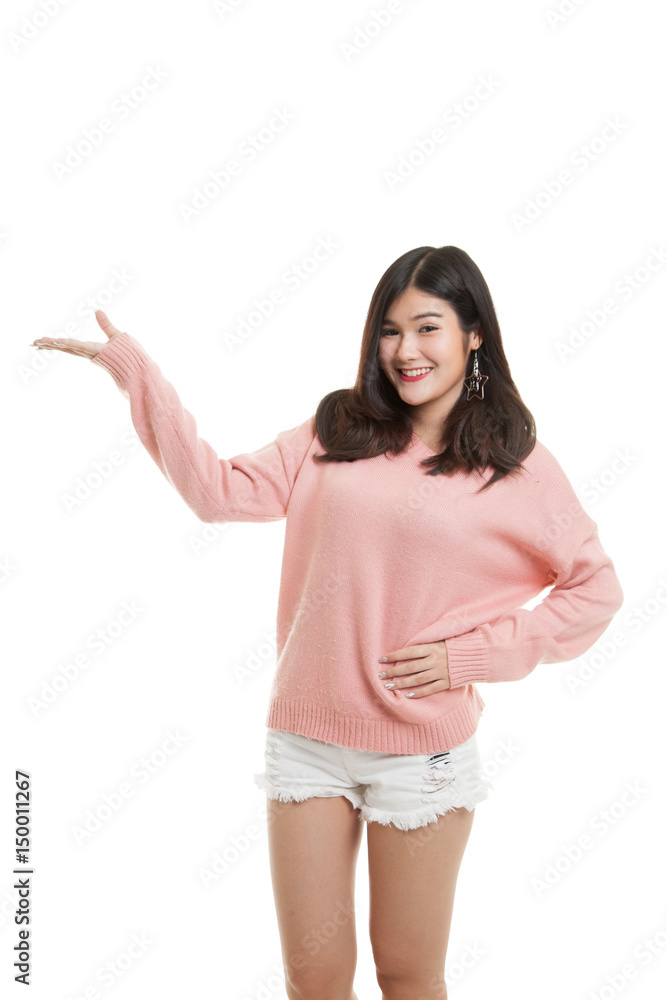 Young Asian woman present with her hand. Young Asian woman present with her hand.