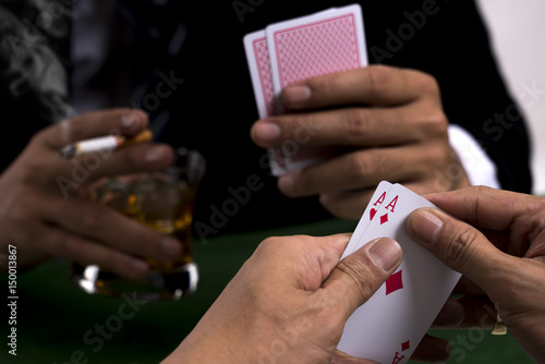 The pair of aces in poker player hand