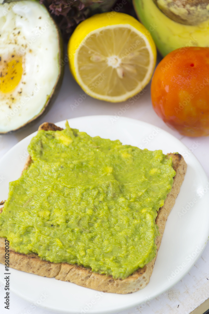 Healthy food. Vegan sandwiches with fresh avocado on wooden background. Healthy food. Vegan sandwiches with fresh avocado on wooden background.