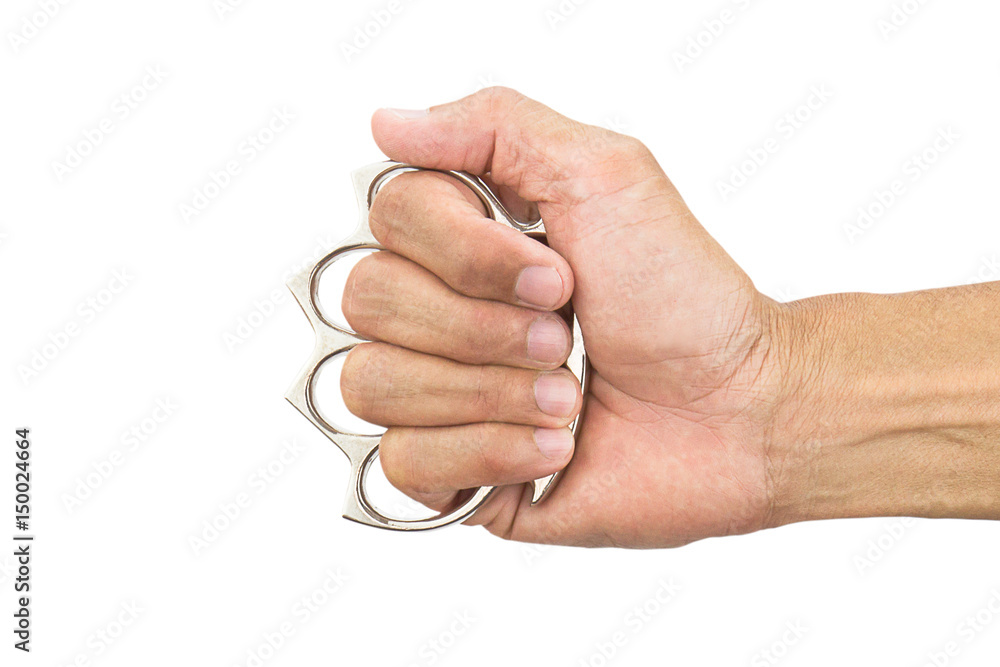 Man's hand wearing iron knuckleduster, hand's weapon, isolated on