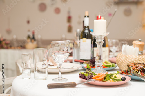 Festive table with snacks and flowers