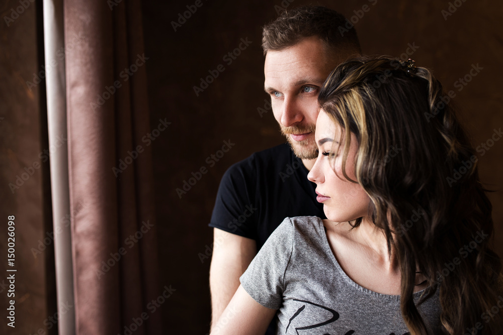 Closeup portrait of beautiful young couple