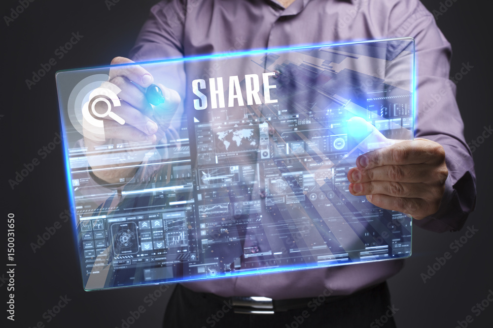 Fototapeta premium Business, Technology, Internet and network concept. Young businessman working on a virtual screen of the future and sees the inscription: Share