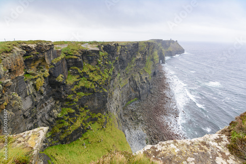 amazing cliffs of Moher on foggy day, Ireland