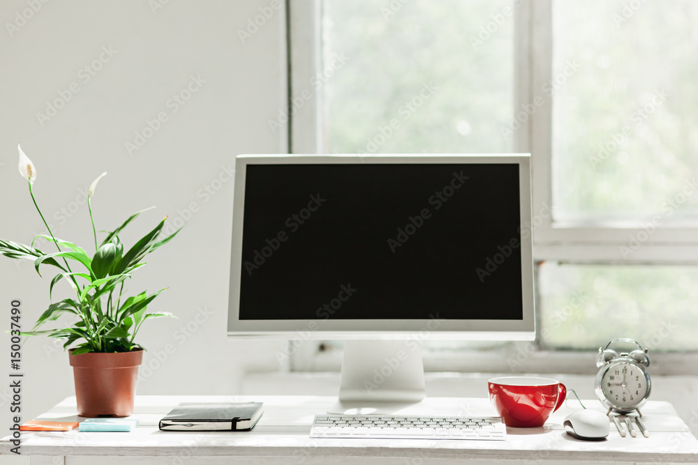 Stylish workspace with computer on home or studio Stylish workspace with computer on home or studio
