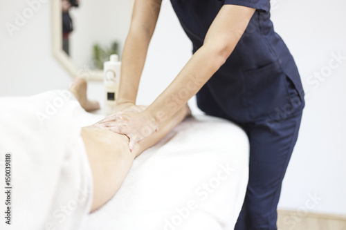 Anti cellulite massage for young woman in beauty salon © nikodash