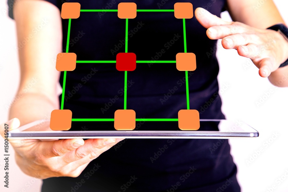 Fotografie Woman with tablet pc and network