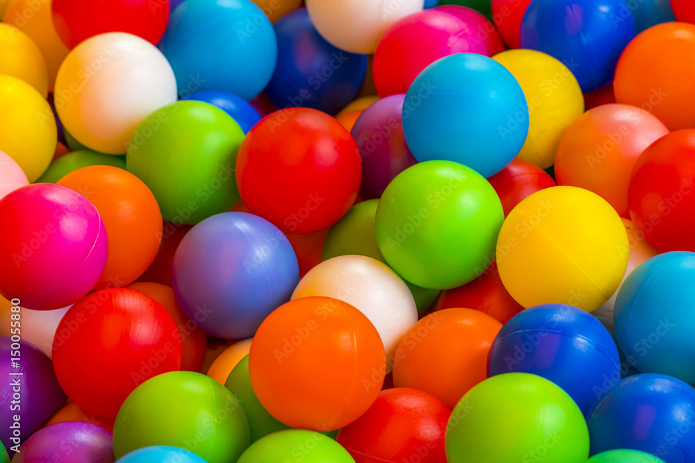 holiday, children's party, a games room, a box filled with small colored balls holiday, children's party, a games room, a box filled with small colored balls