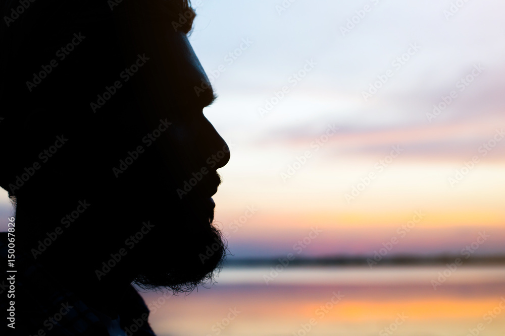 Silhouette close up of a men face. Silhouette close up of a men face.