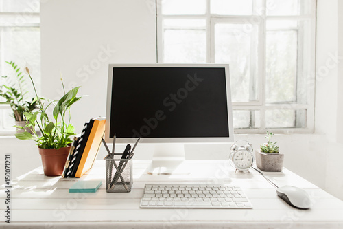 Stylish workspace with computer at home or studio