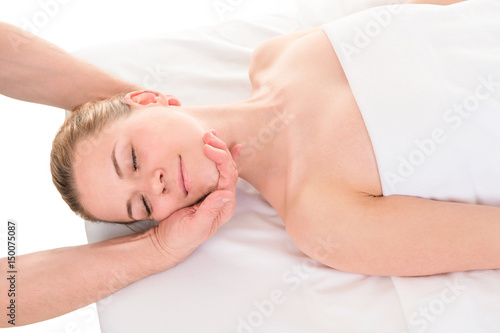 Young woman having head massage close up