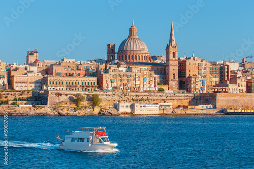 Valletta citiscape with bay cruise boat, Malta, EU