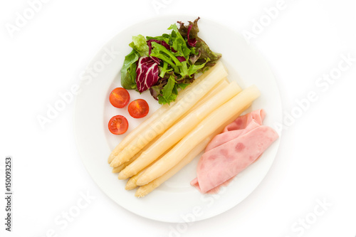 White asparagus with salad and ham isolated on white background.Top view

