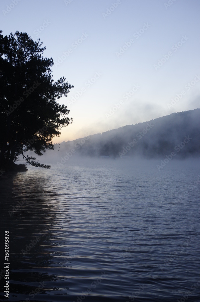 Lake with mist rising