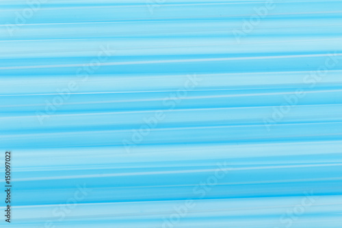 blue drinking straw for background