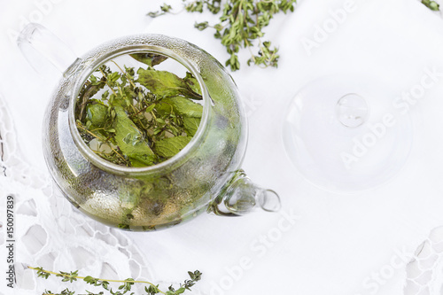 herbal tea with mint and thyme photo