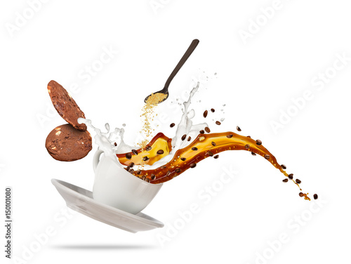 Porcelaine white cup with splashing coffee liquid and biscuits isolated on white background.