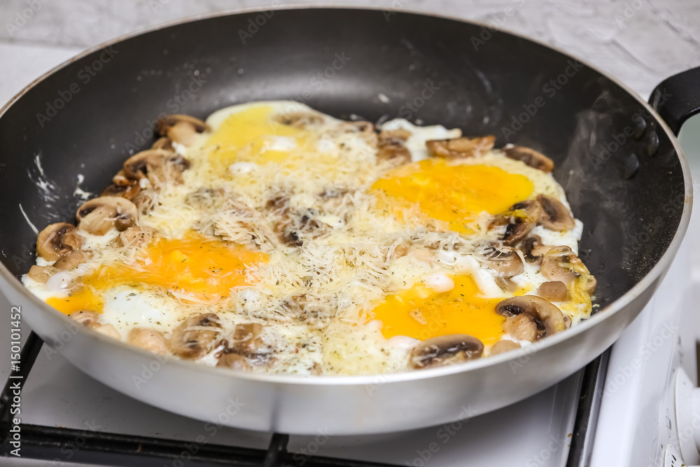 Fried eggs with mushrooms for a breakfast Fried eggs with mushrooms for a breakfast