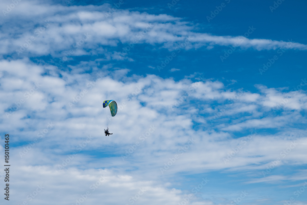 Flying paragliding on the beach