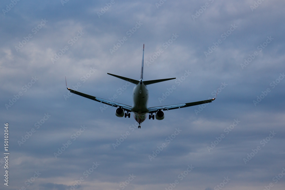 The plane lands at dusk The plane lands at dusk