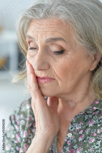 Beautiful sad elderly woman