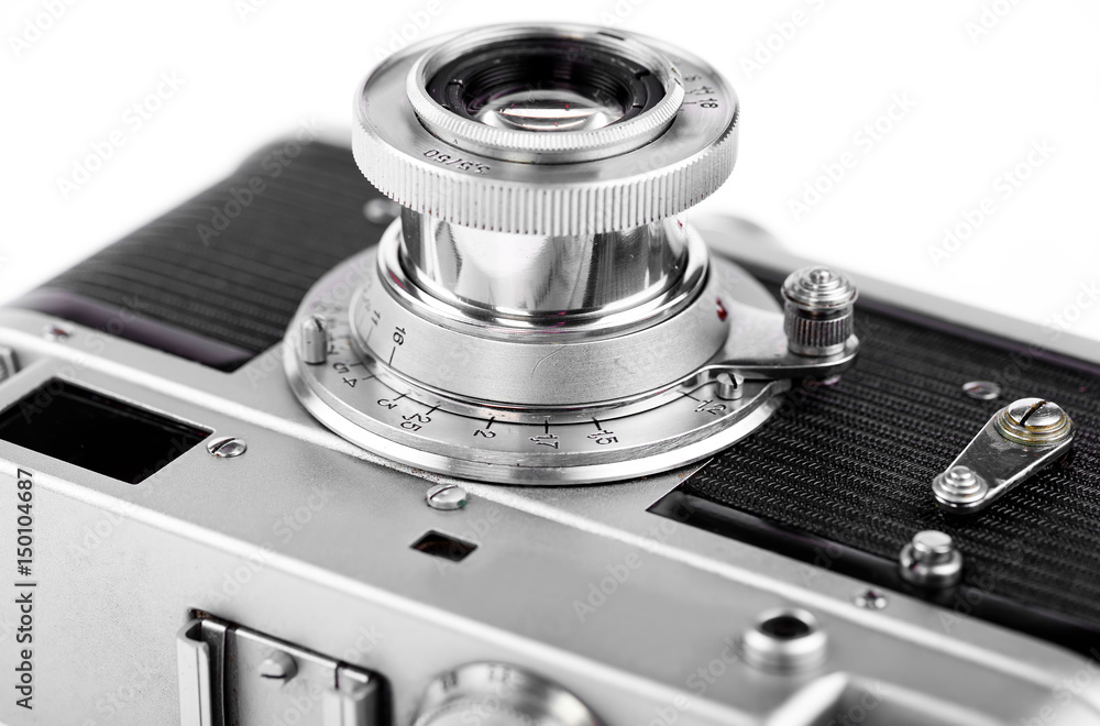 Old camera on white background on desk Old camera on white background on desk