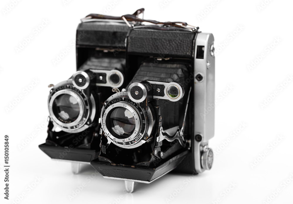 Old camera on white background on desk Old camera on white background on desk