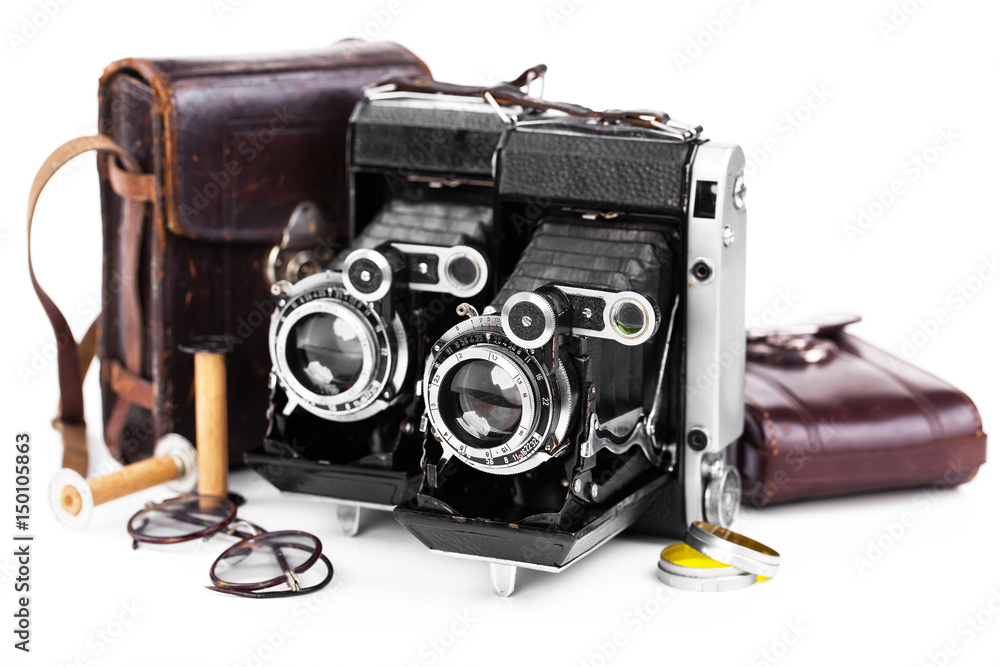 Old camera on white background on desk Old camera on white background on desk