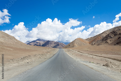 The road cuts through the rocky mountainside Magnetic Hill Road, Leh Ladakh India