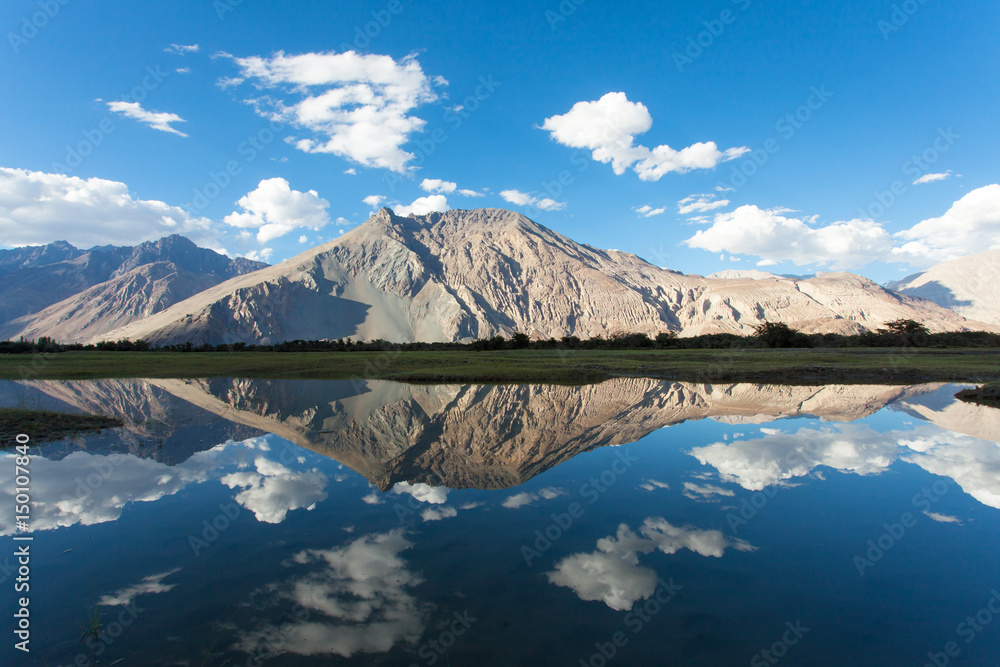 Mountains reflect the surface at Nubra Valley, Leh Ladakh India