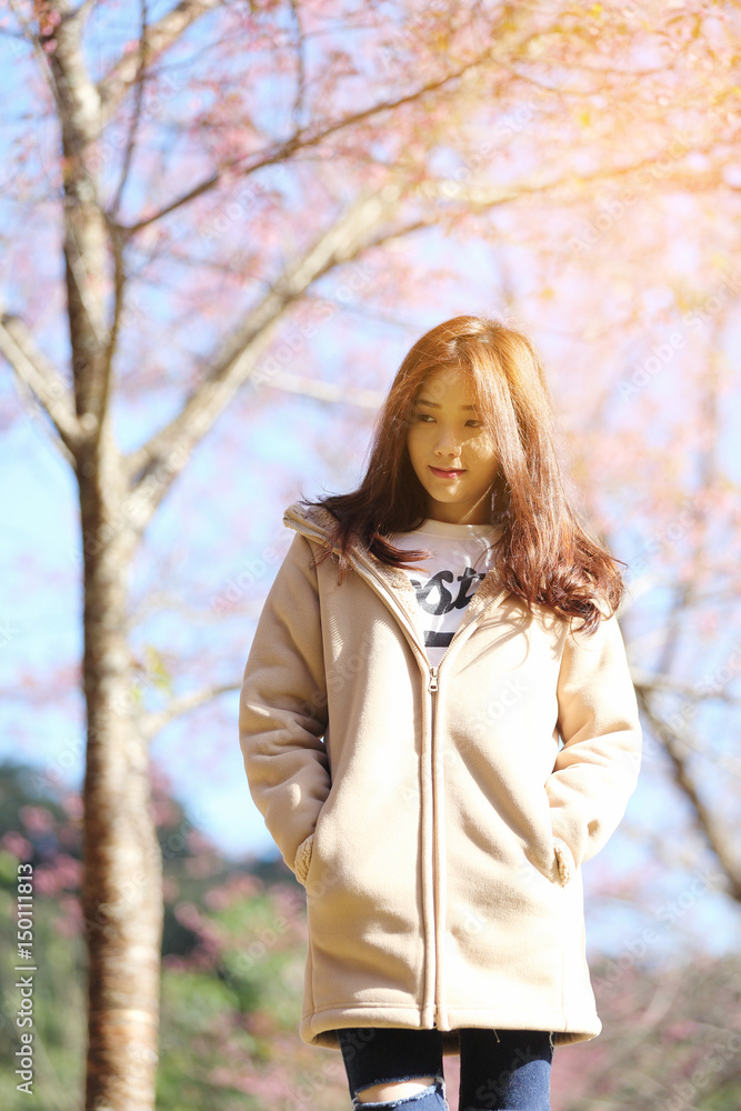 Asian Woman with cherry blossom nature background Asian Woman with cherry blossom nature background