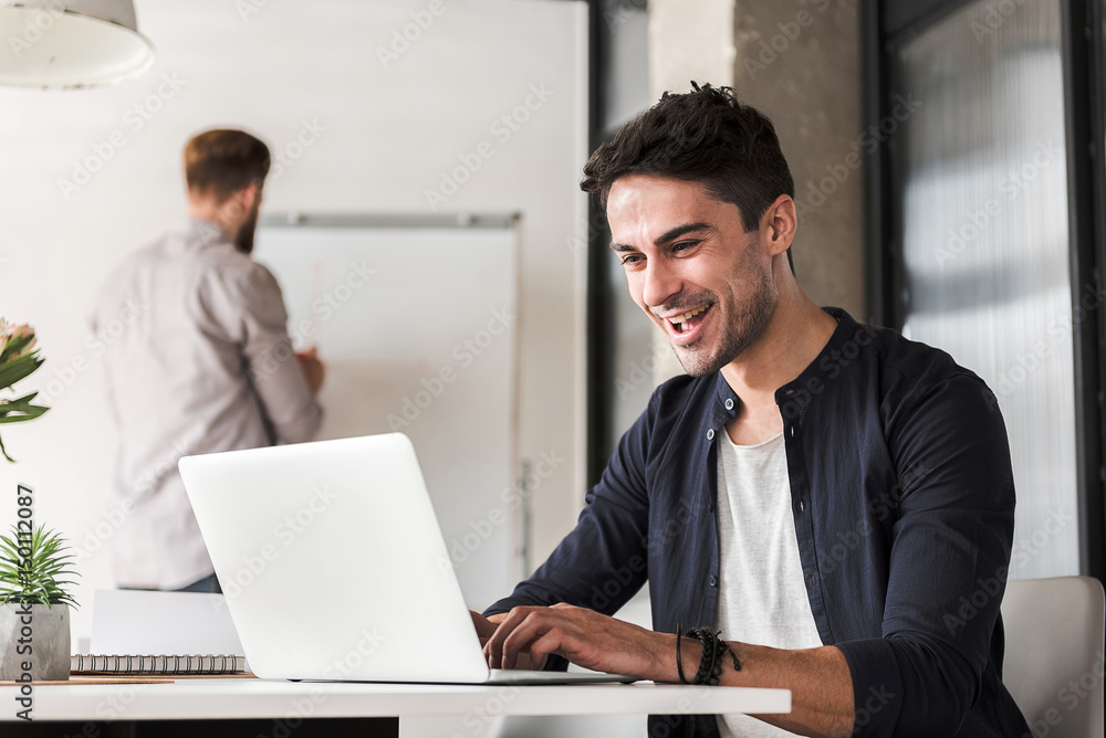 Cheerful office worker in work Cheerful office worker in work