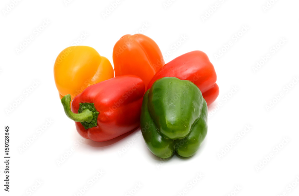 Fresh colorful bell peppers on the white background Fresh colorful bell peppers on the white background