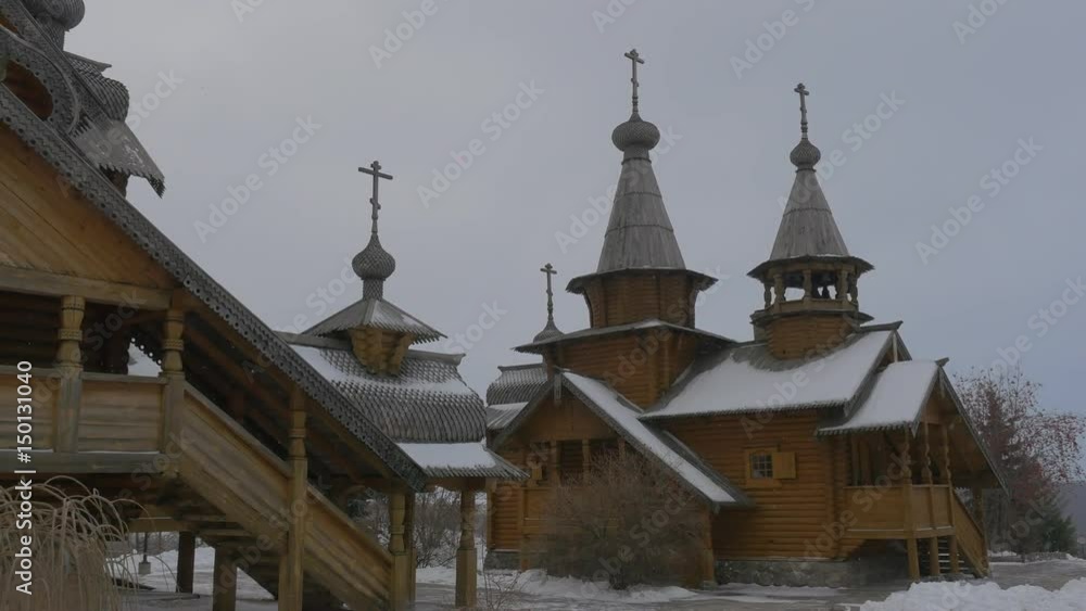 Orthodox Wooden Skit of All Saints Wooden Church in Sviatogorskaya Lavra Complex Impressive Fairy Tale Two Storeyed Log Buildings in Winter Twilight Orthodox Wooden Skit of All Saints Wooden Church in Sviatogorskaya Lavra Complex Impressive Fairy Tale Two Storeyed Log Buildings in Winter Twilight