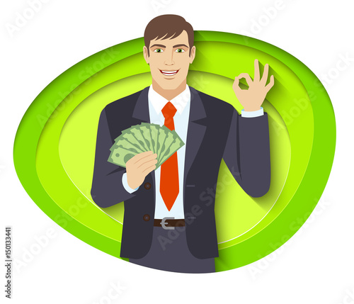 Businessman with cash; money showing a okay hand sign