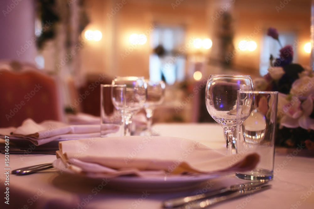 Glass wine glasses on the table served in the restaurant