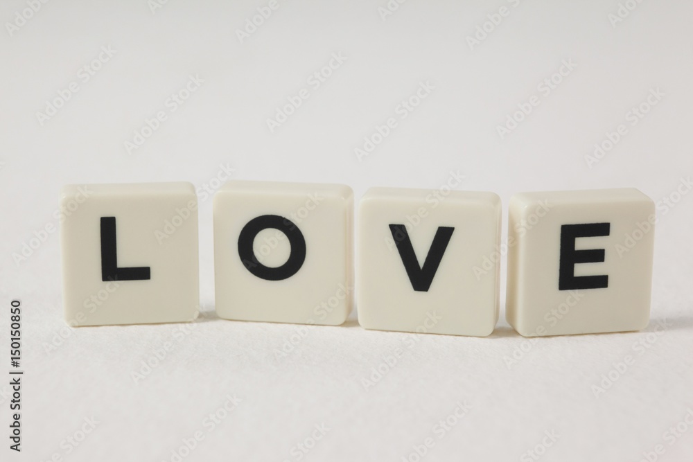 White blocks displaying love message