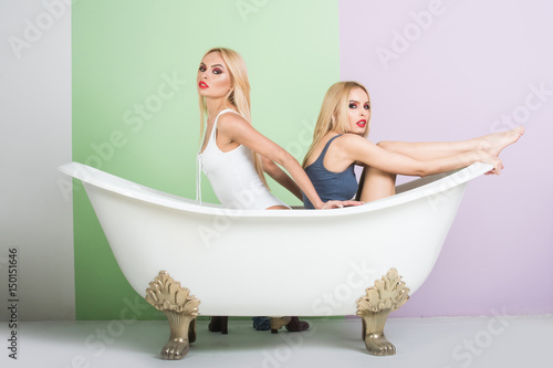 Spa and relaxation, pretty girls in white bath
