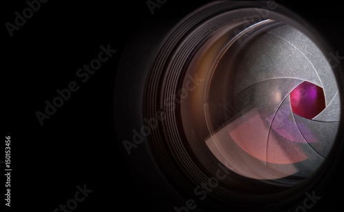 Camera lens on black background.
